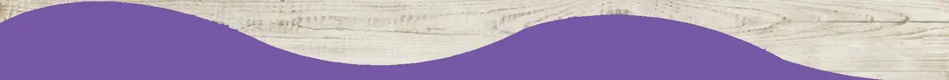 A purple banner with a white background and some wood